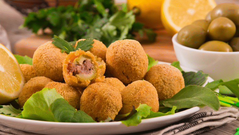 Olive ascolane, il finger food che nasce da una ricetta nobile | Storiografia gastronomica - immagine di copertina